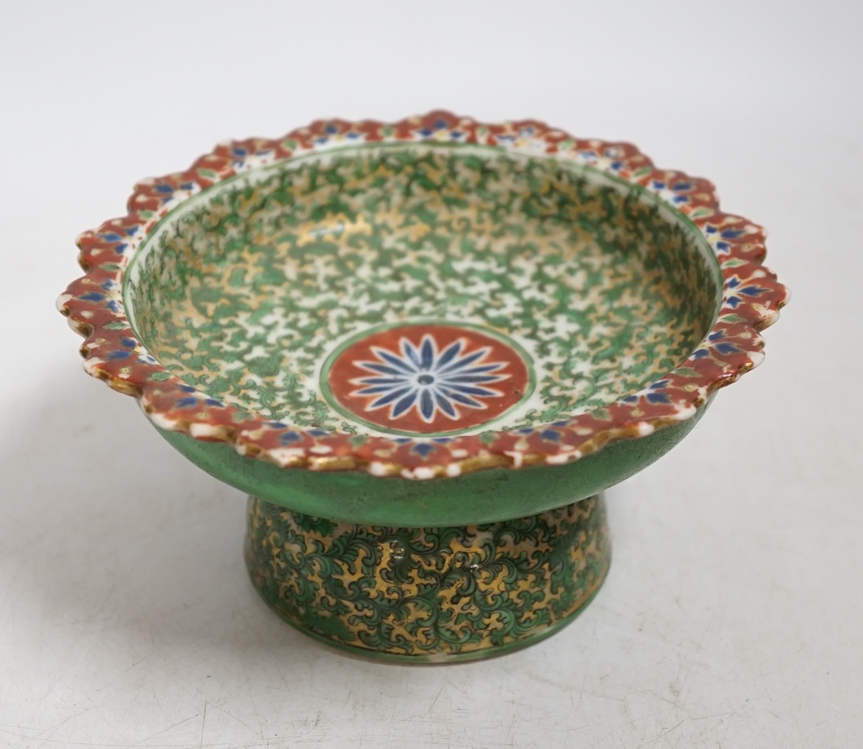 A Chinese enamelled porcelain stem dish, late 19th century possibly Thai market, 14cm diameter. Condition - fair